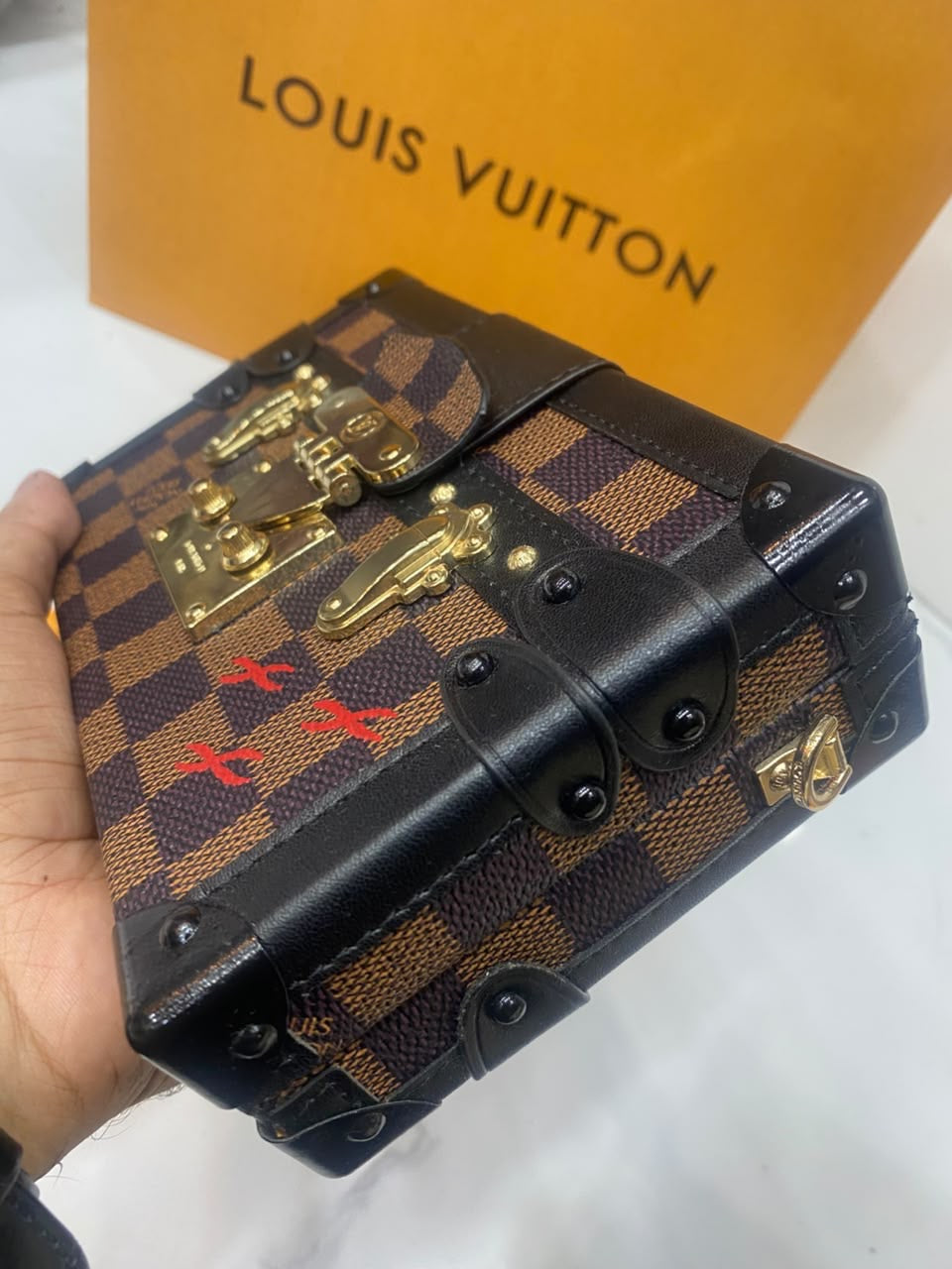 L V famous brand clutch