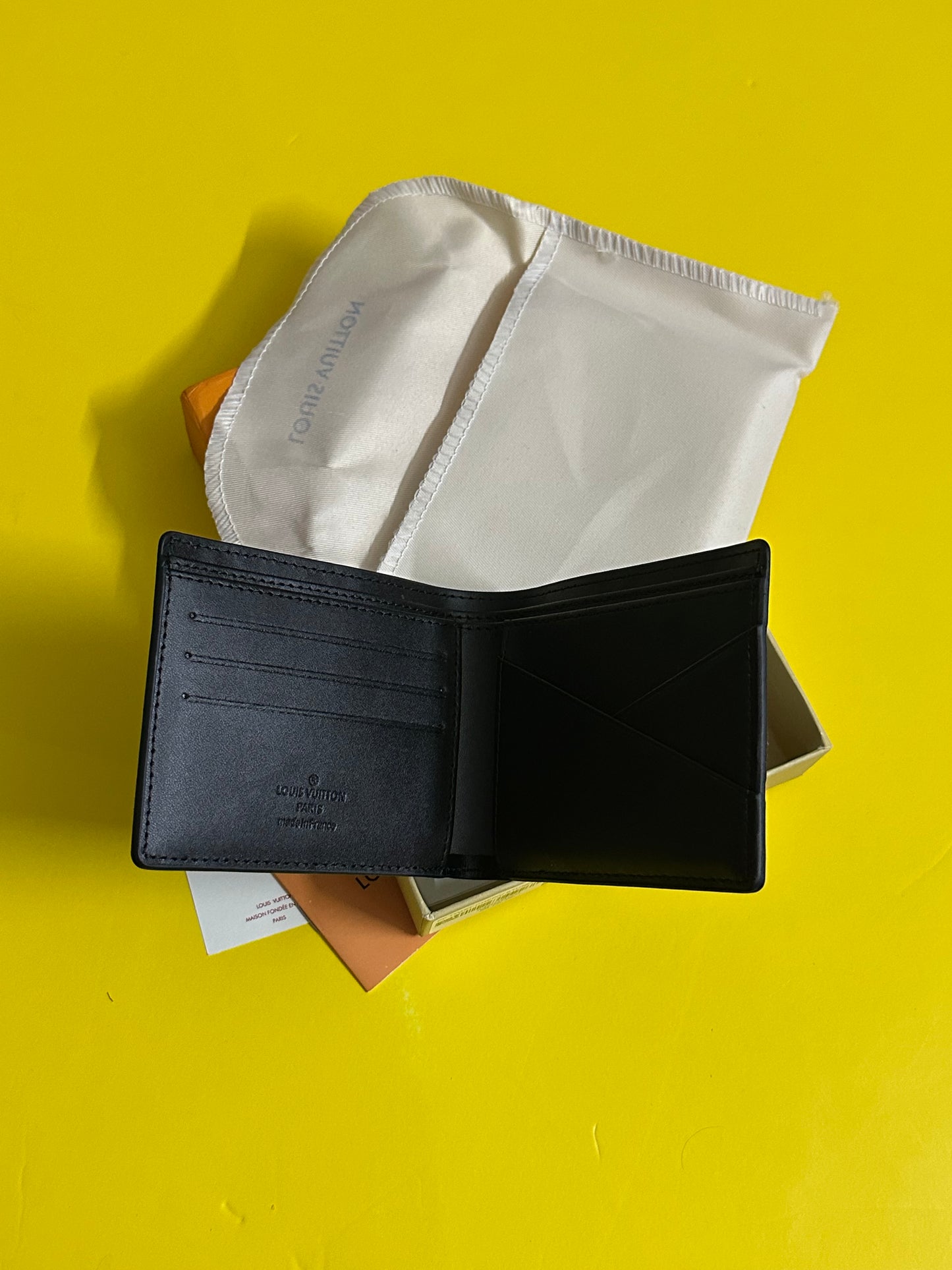 LV black embossed wallet