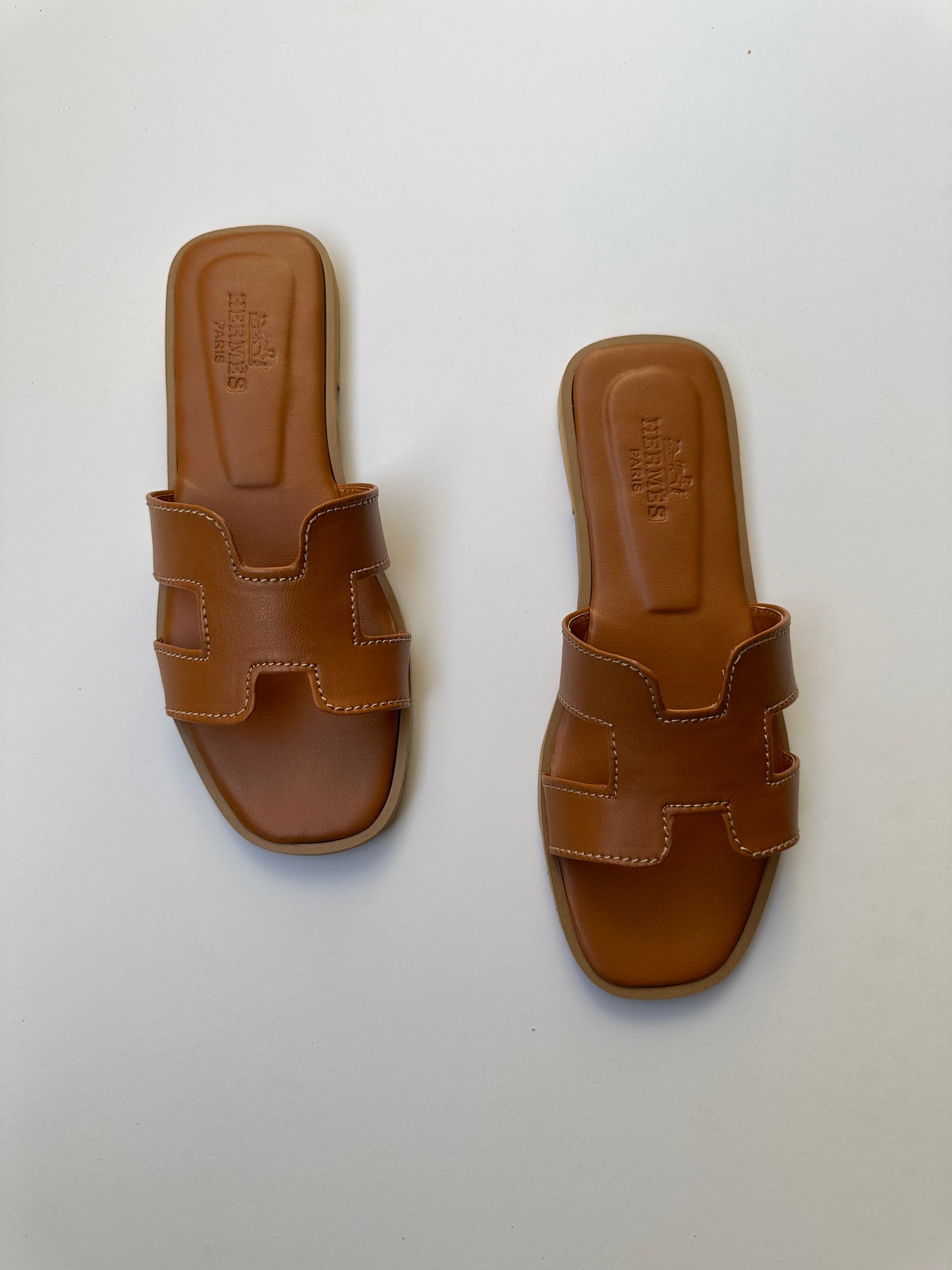 Hermes brown slide