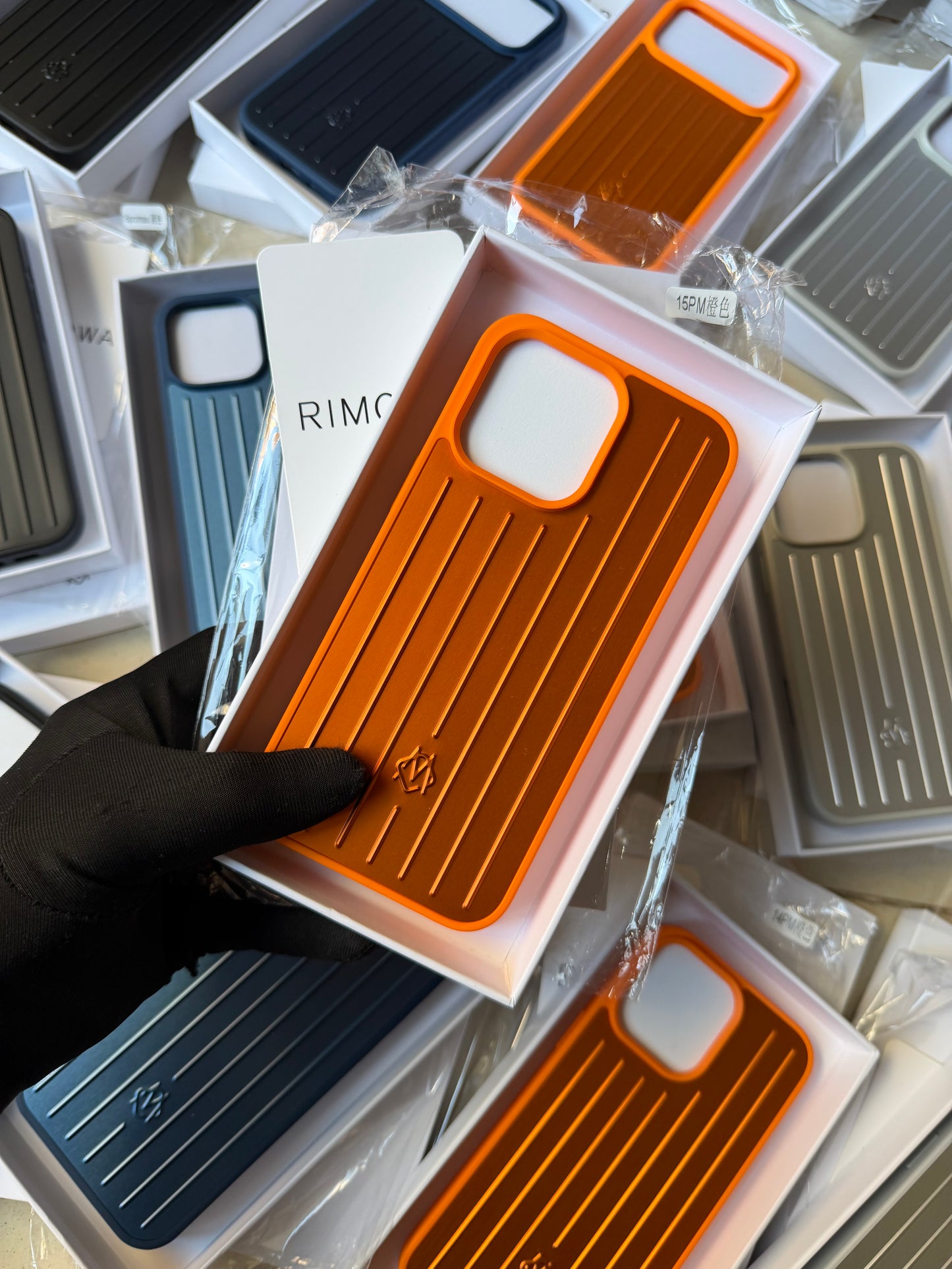 Rimowa iphone 17/16/15/14 back cover orange
