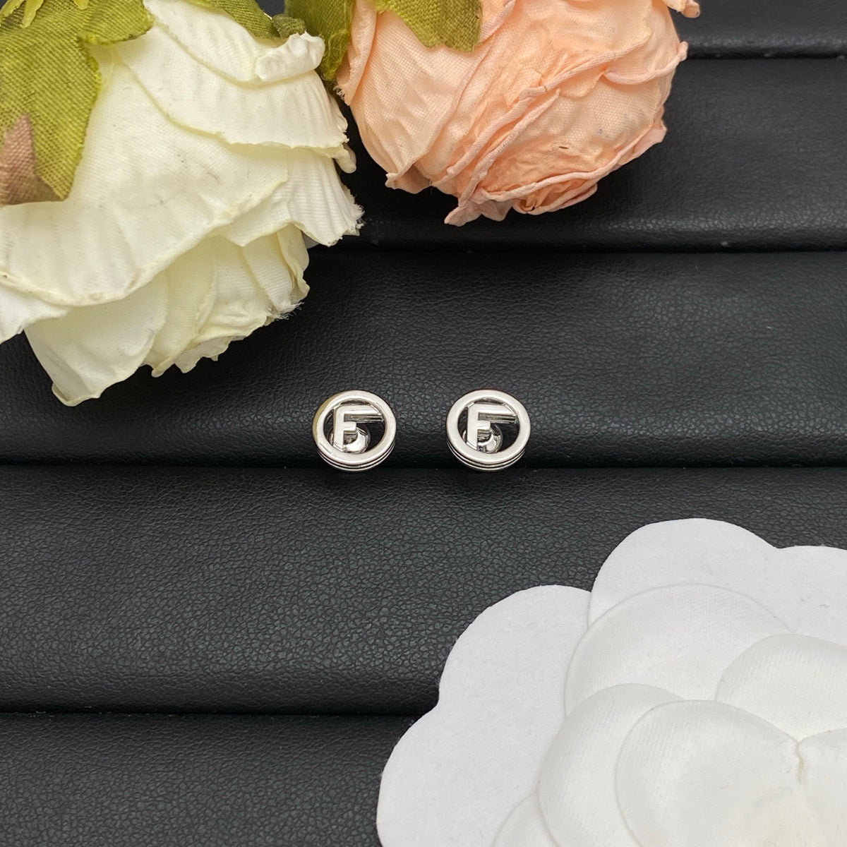F e n d i earrings ( golden & silver )