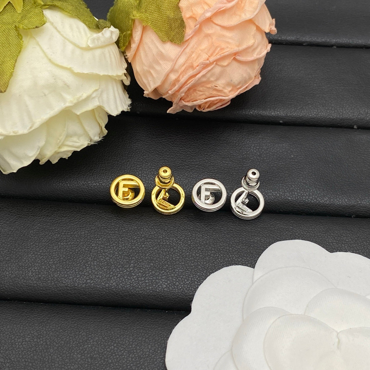 F e n d i earrings ( golden & silver )