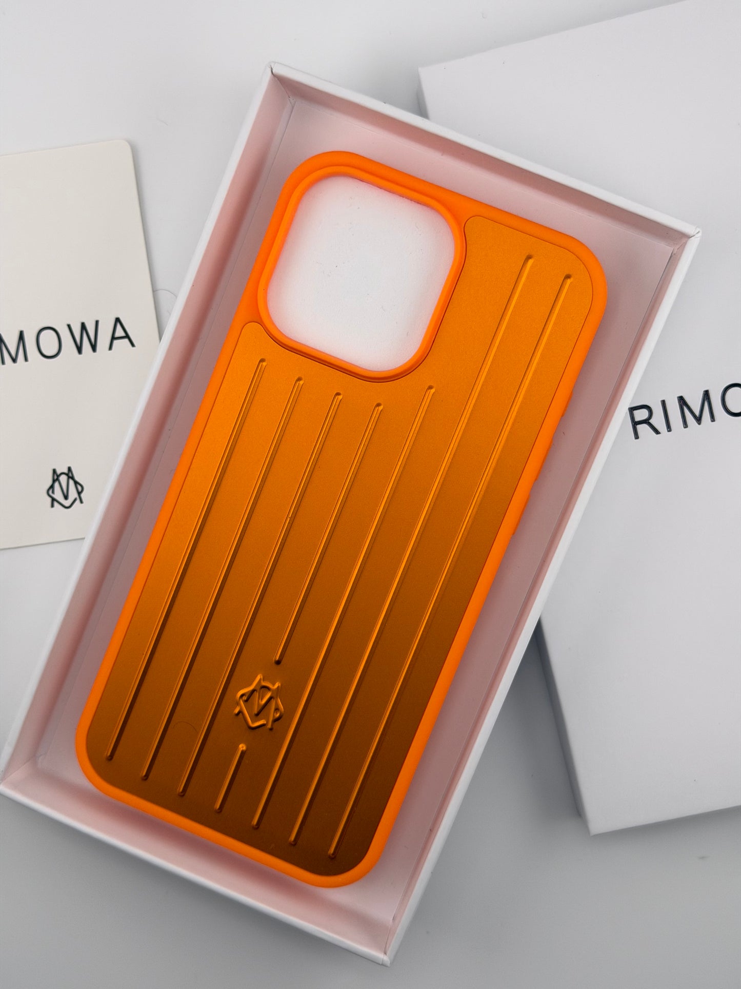 Rimowa iphone 13promax orange color