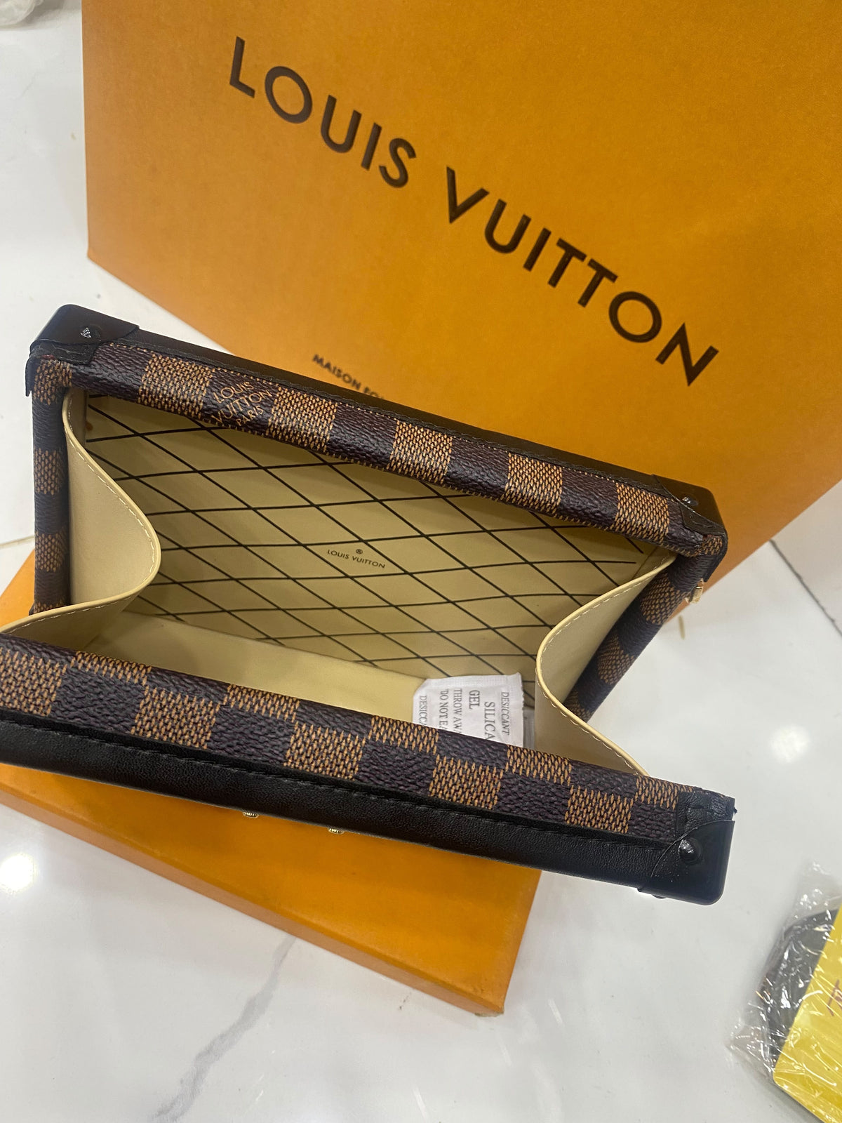 L V famous brand clutch