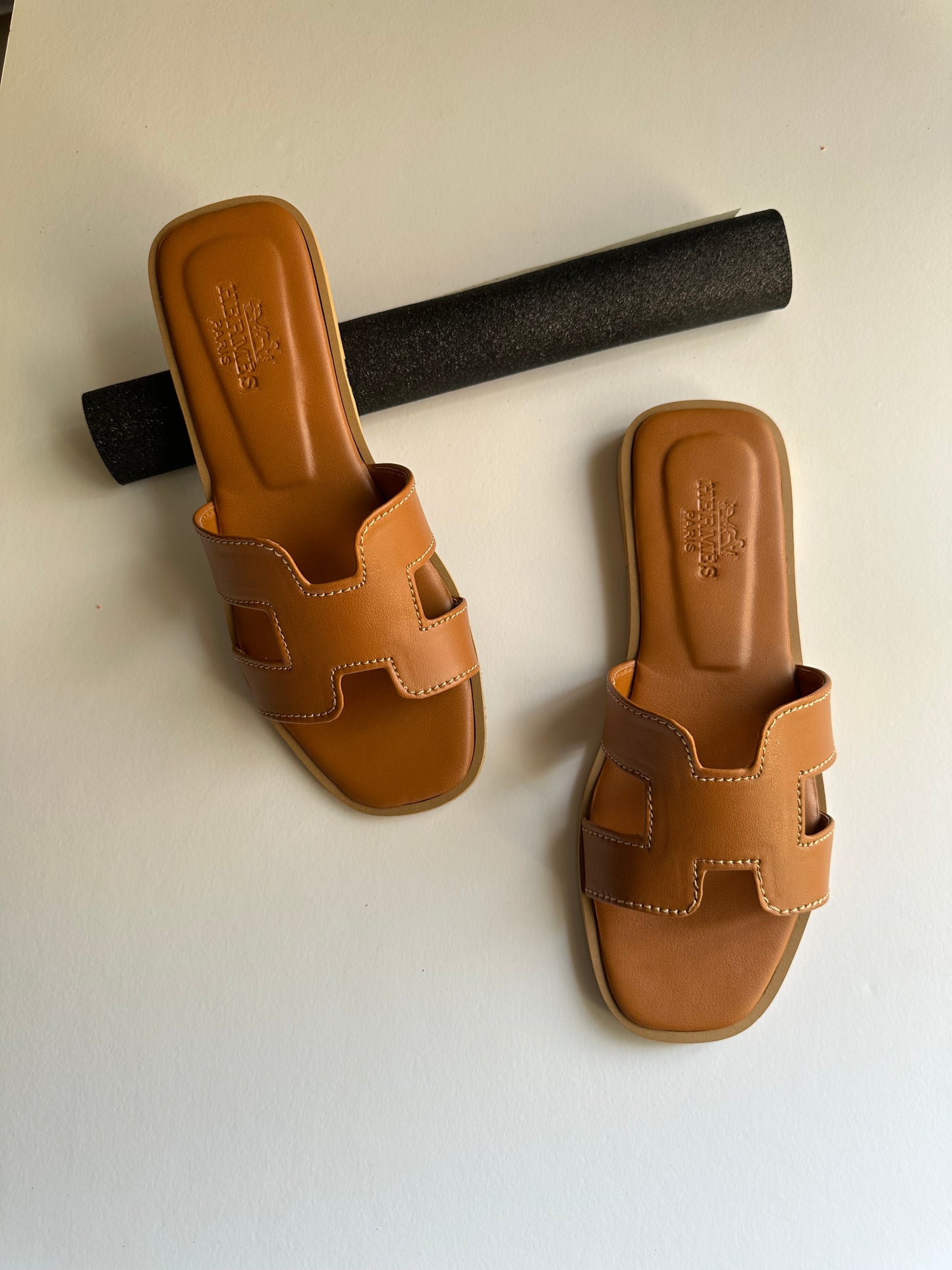 Hermes brown slide