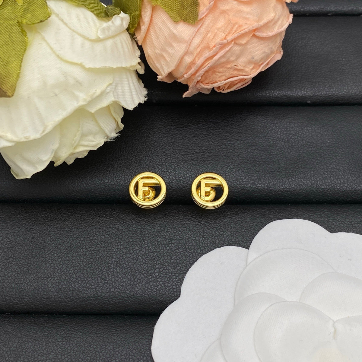 F e n d i earrings ( golden & silver )