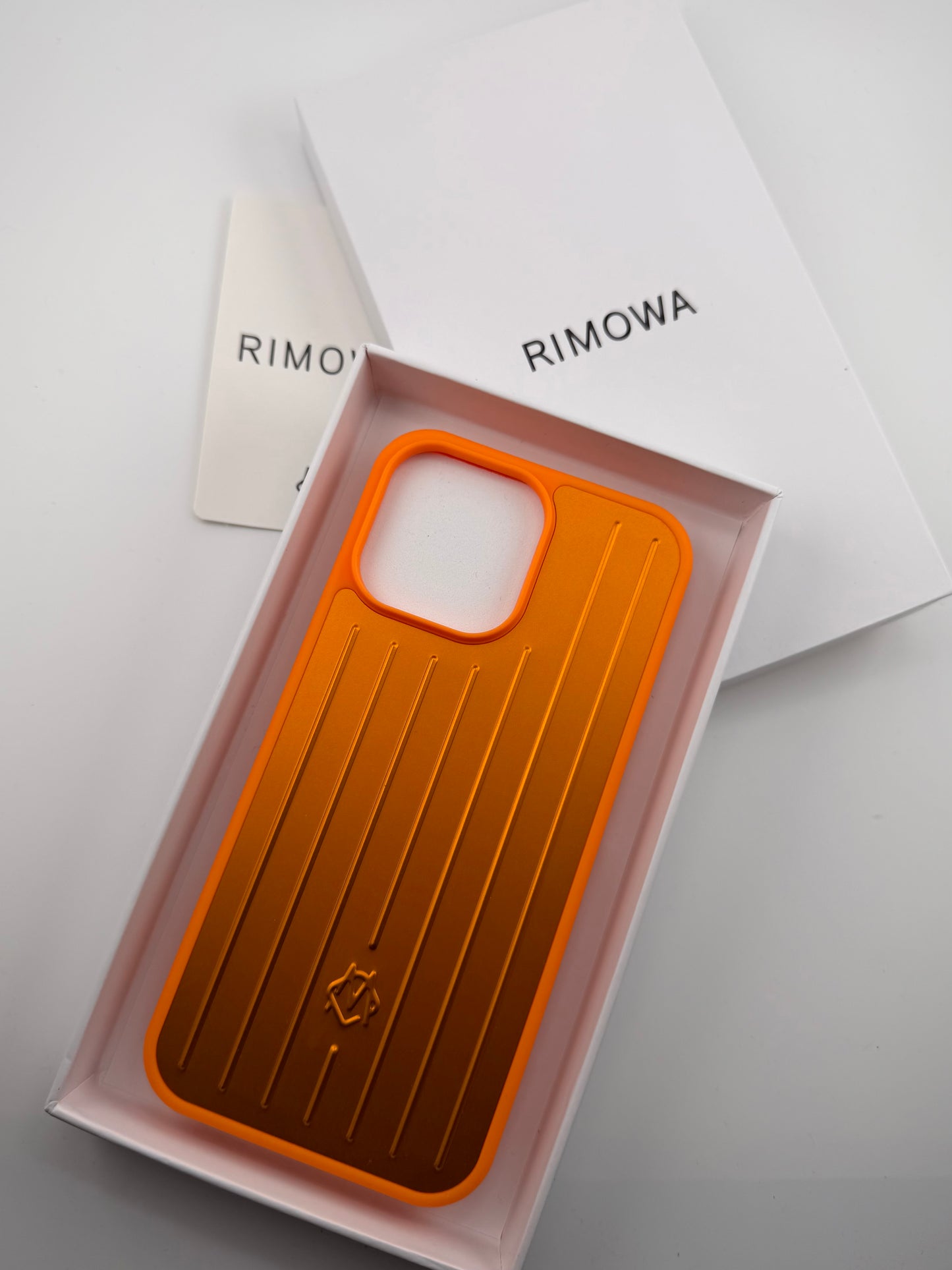 Rimowa iphone 13promax orange color