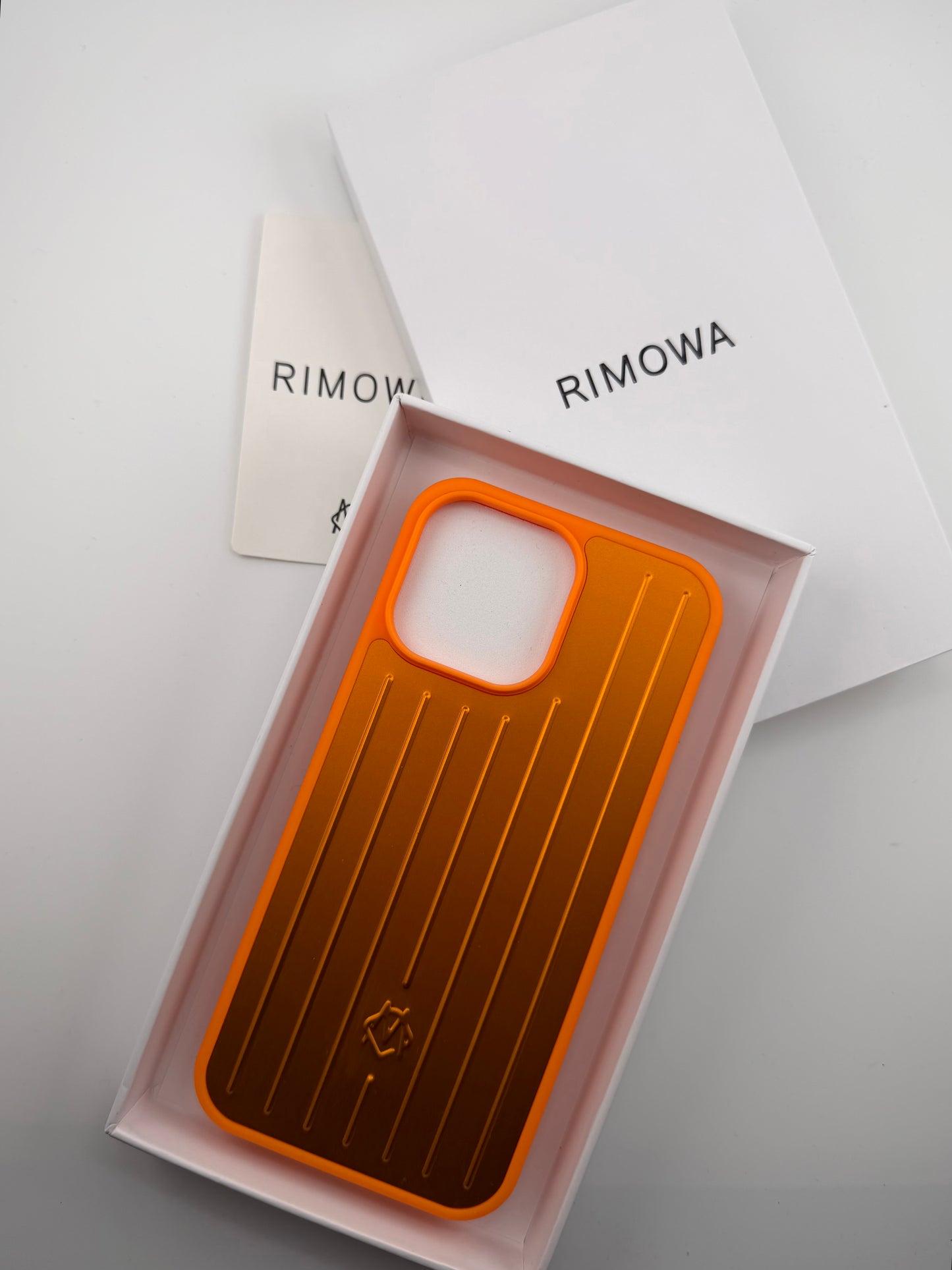Rimowa iphone 13promax orange color