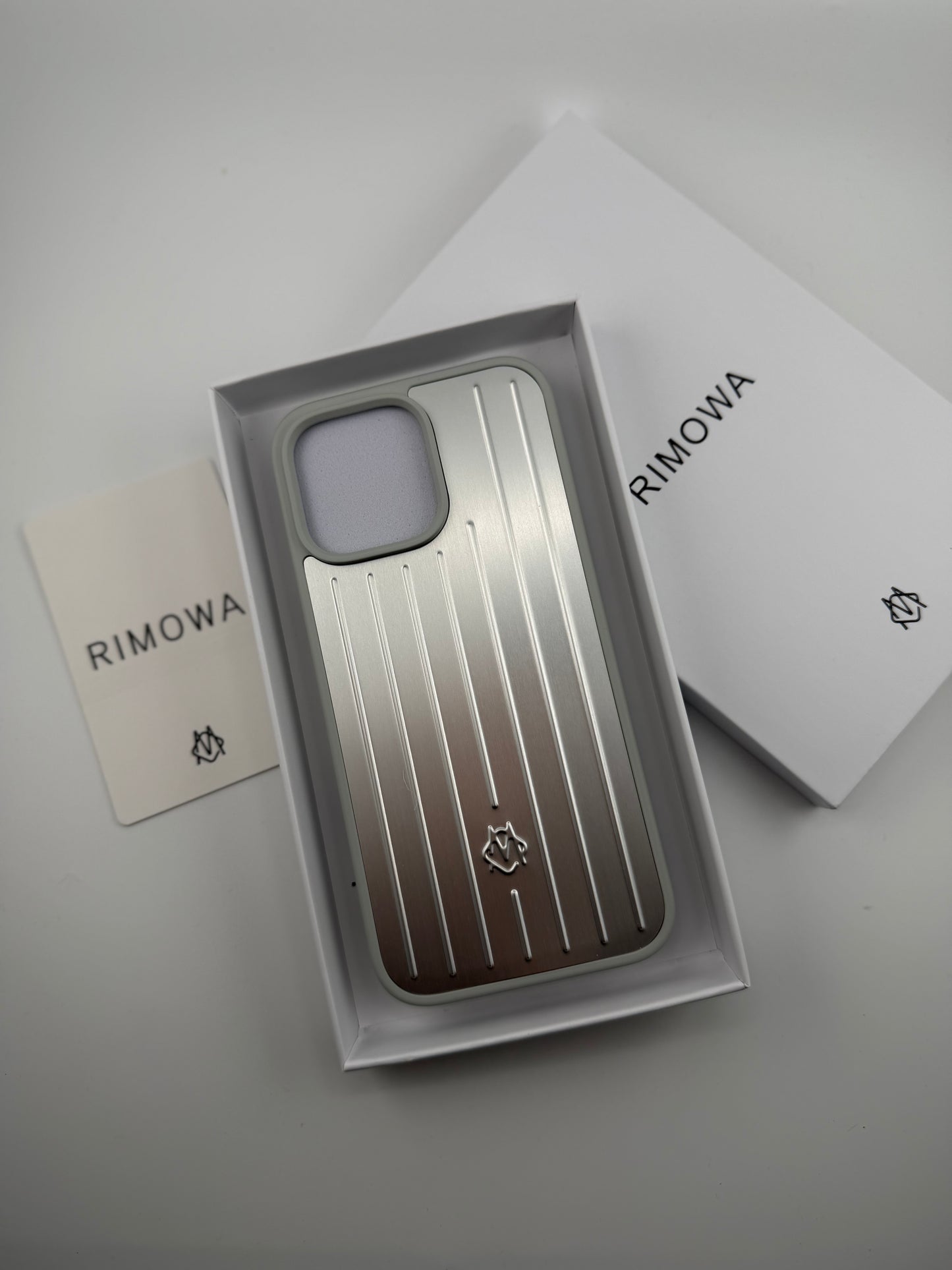 Rimowa iphone 11promax silver color