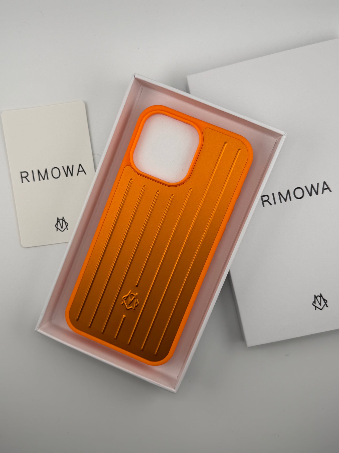 Rimowa iphone 13promax orange color