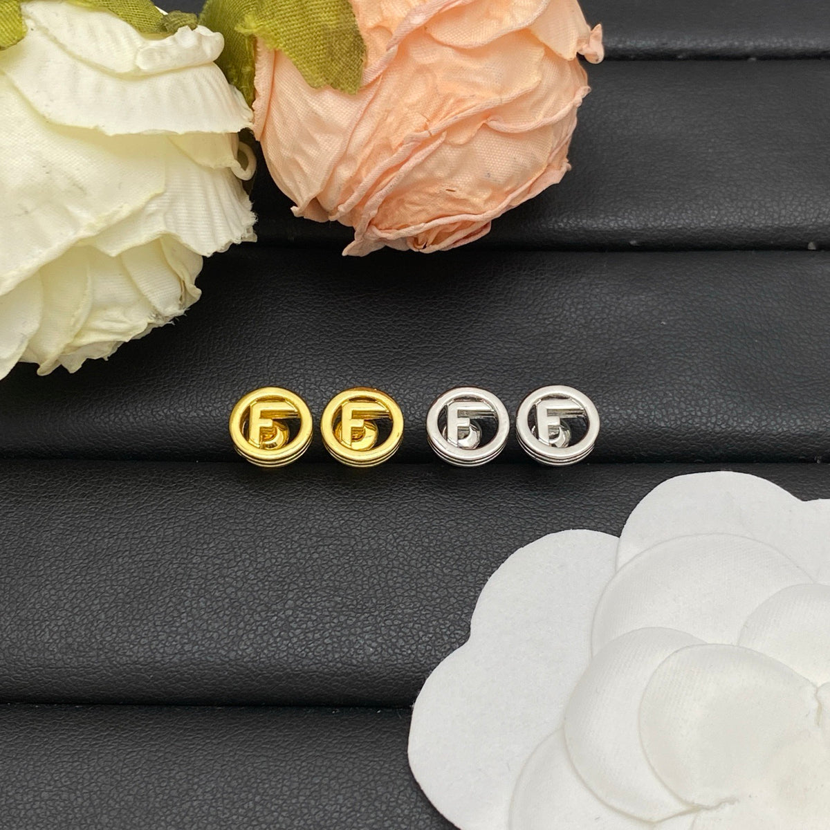 F e n d i earrings ( golden & silver )