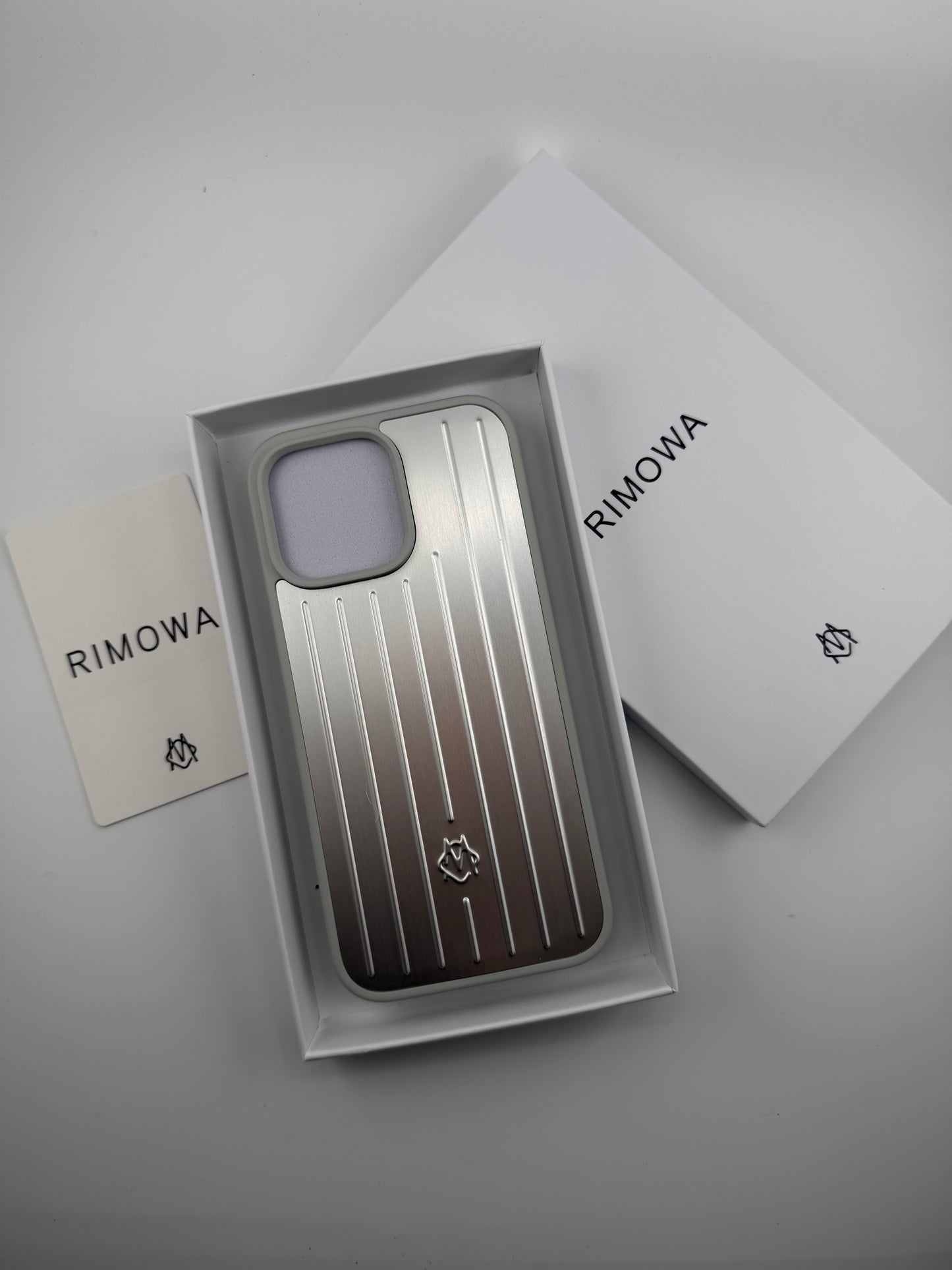 Rimowa iphone 11promax silver color