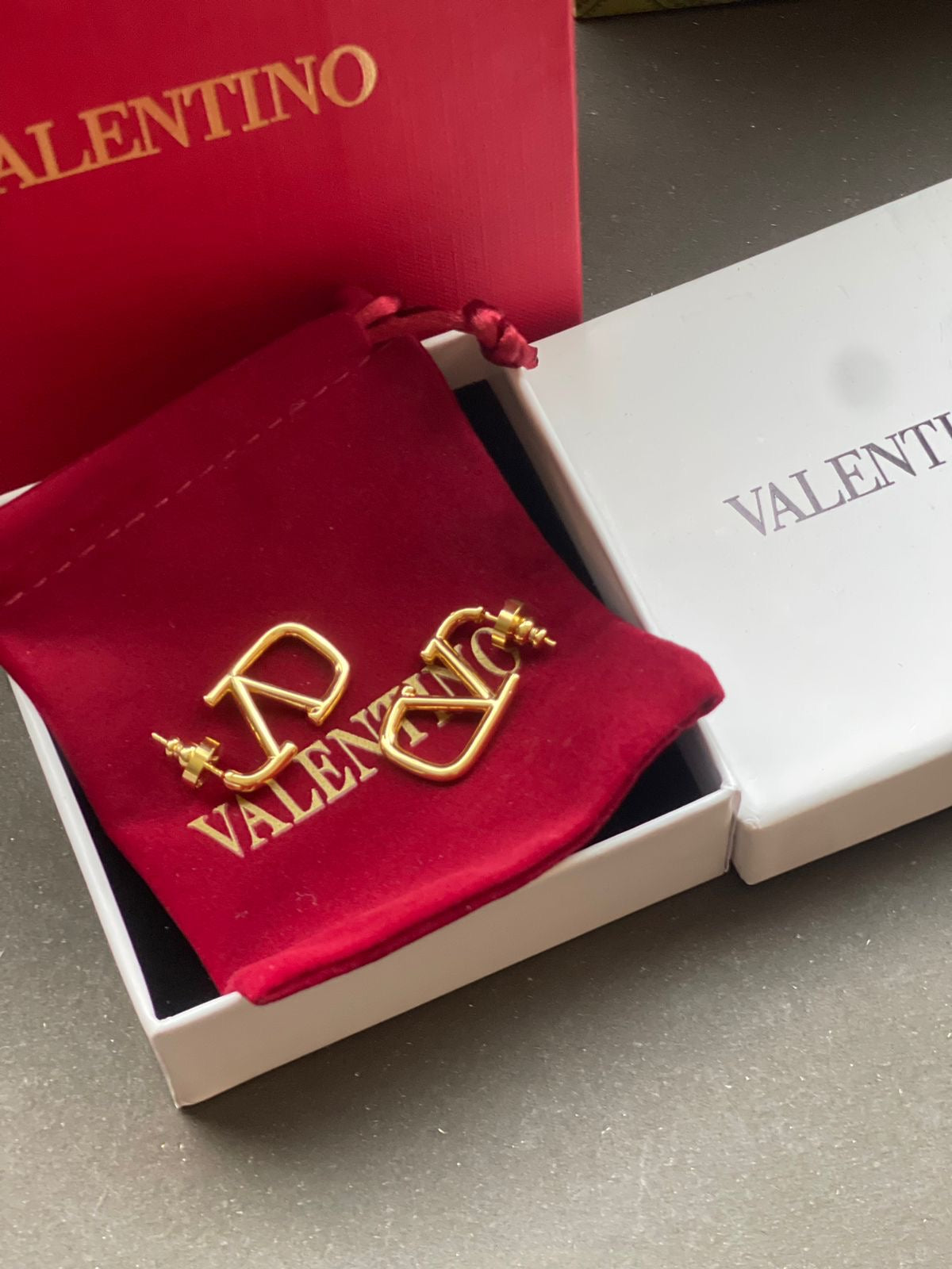 V earrings famous brand