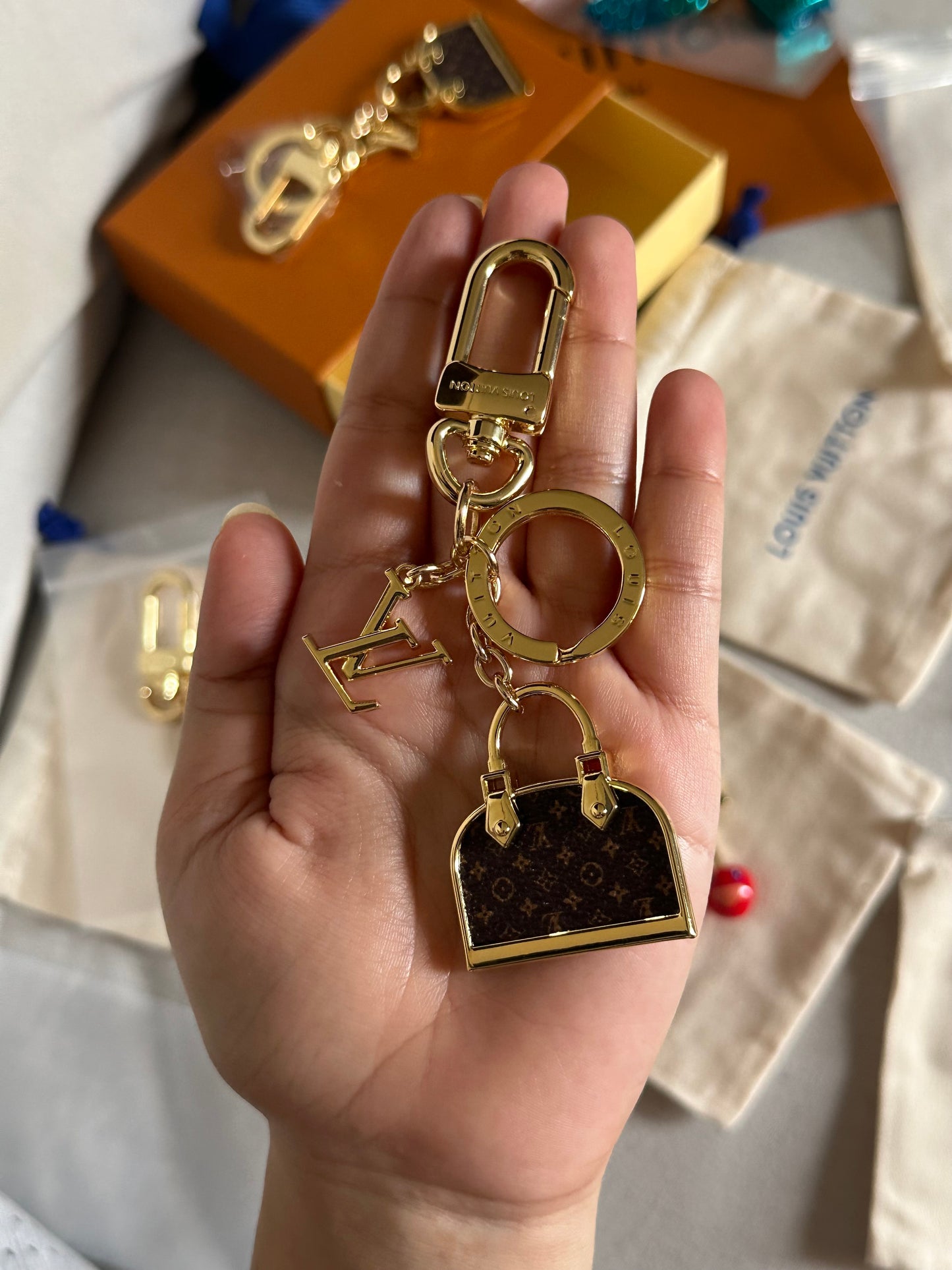 LV bag charm