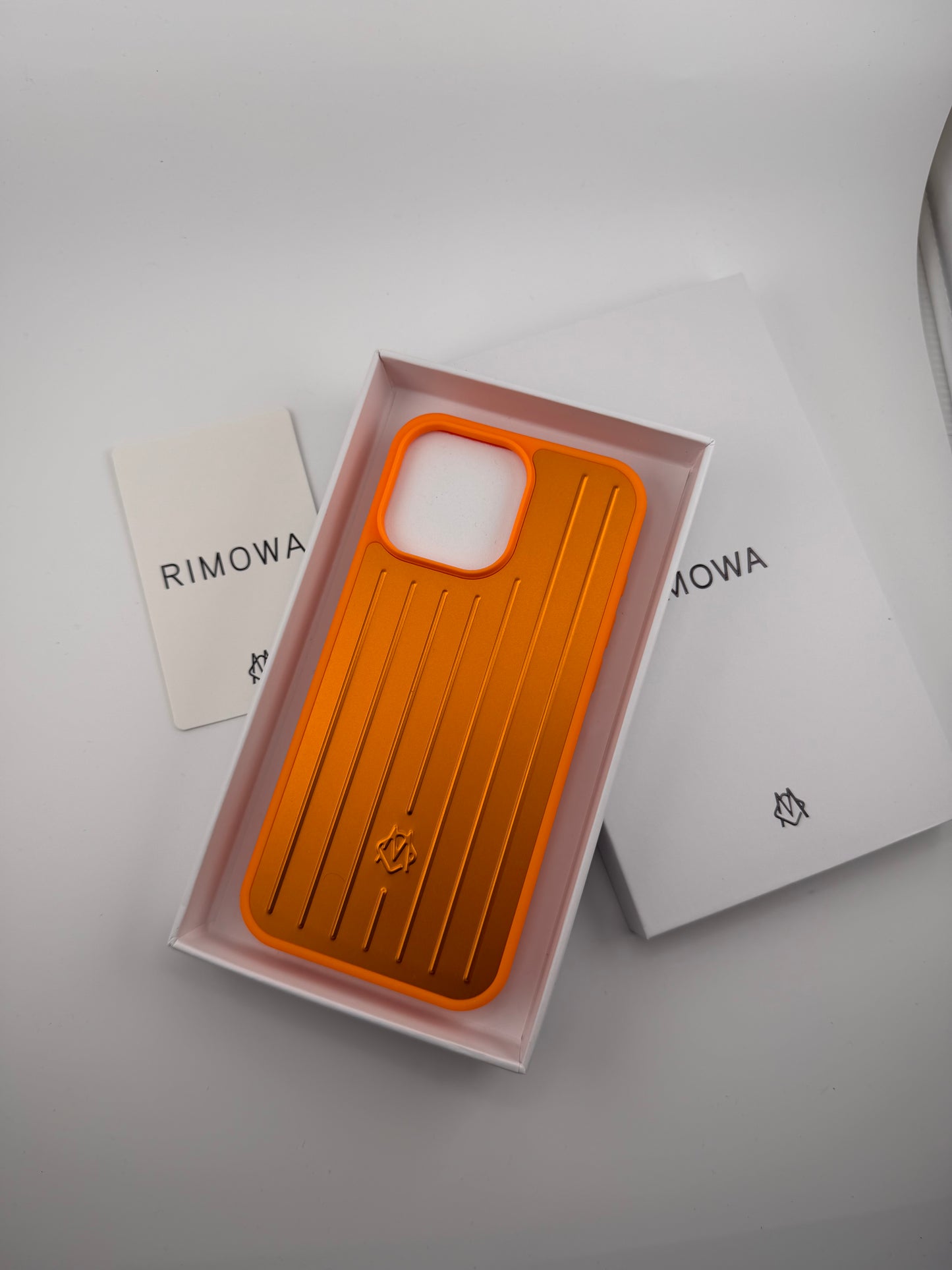 Rimowa iphone 13promax orange color